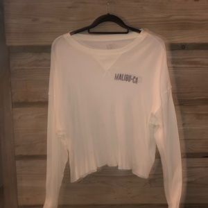 White Brandy Melville long sleeve shirt.